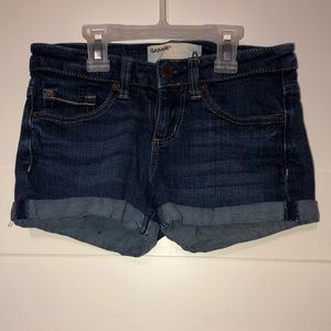 Dark wash denim shorts with rolled bottom